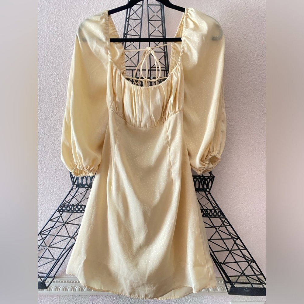 Butter yellow puff sleeve tie in the back size small dress